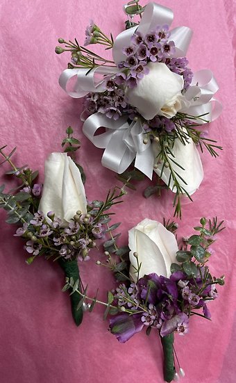 Double rose corsage and matching boutonnière