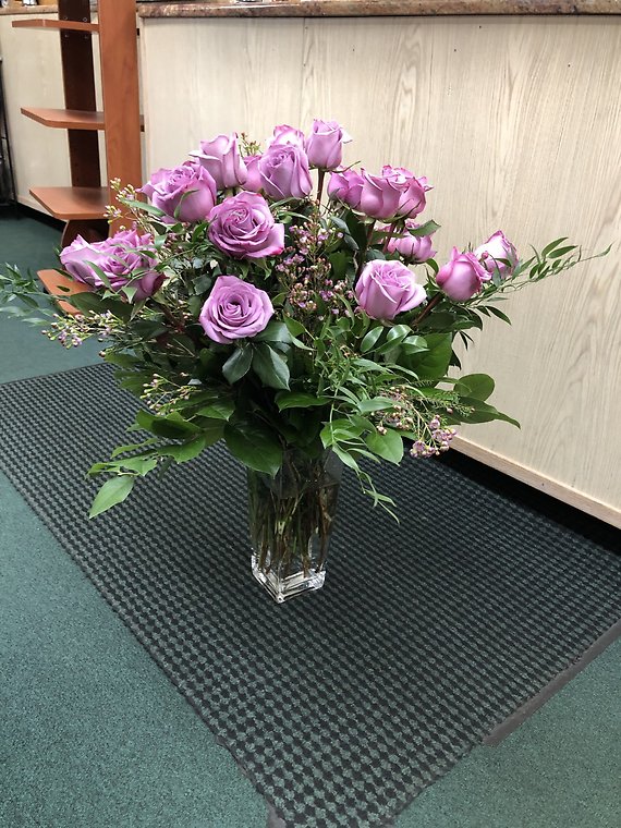 Lavender roses with wax flower