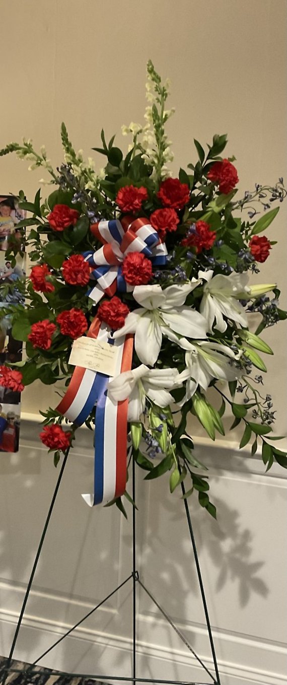 P red white and blue spray