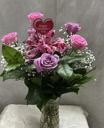 R6 pink and lavender roses vase