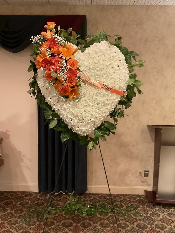 White heart with orange roses